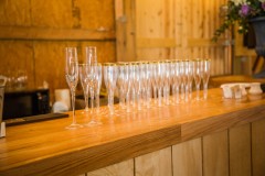 wedding-barn-bar-setup-champagne-toast